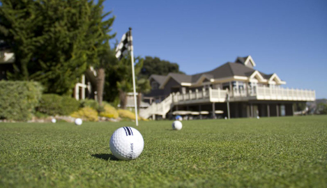 golf ball in front of countryclub 