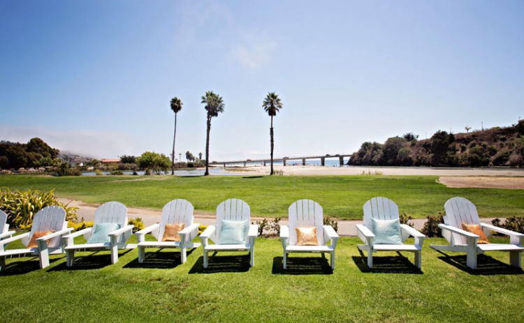 lawn chairs facing away from the coast